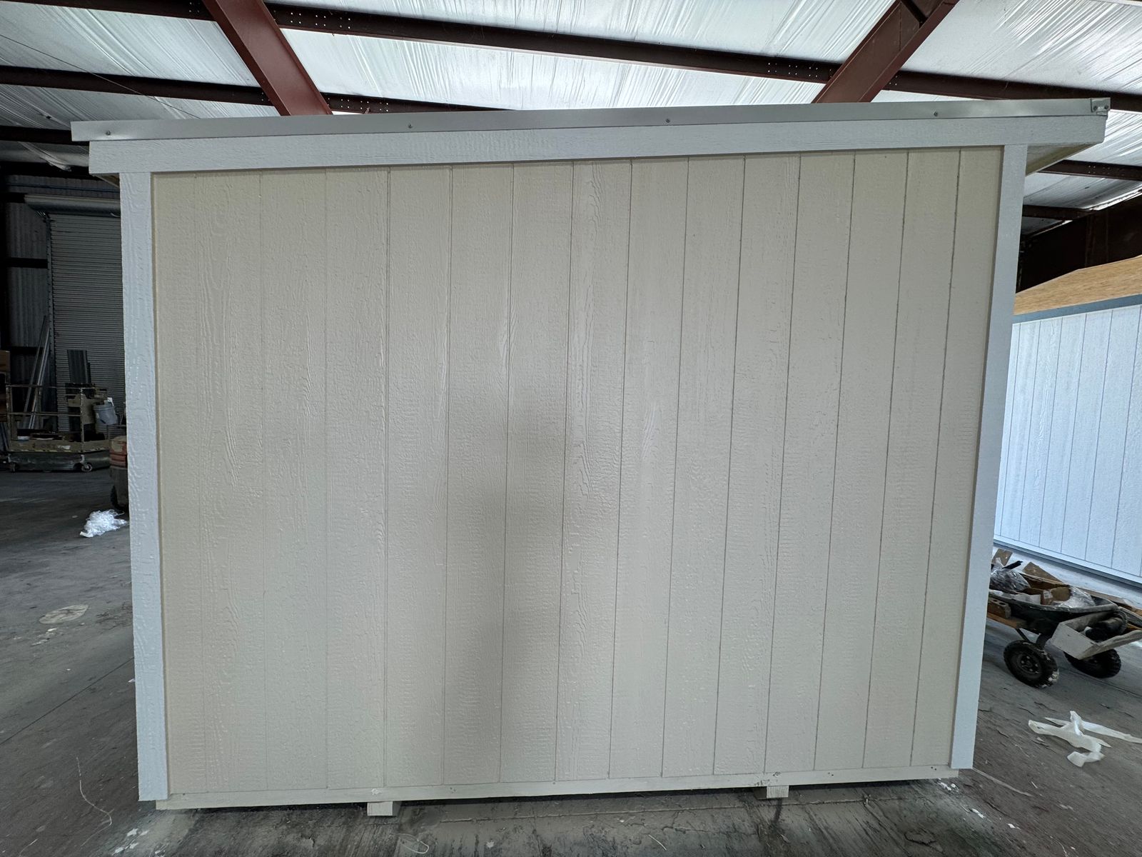 10x16 Stor-Mor Cottage Shed in Navajo White, side wall with white trim