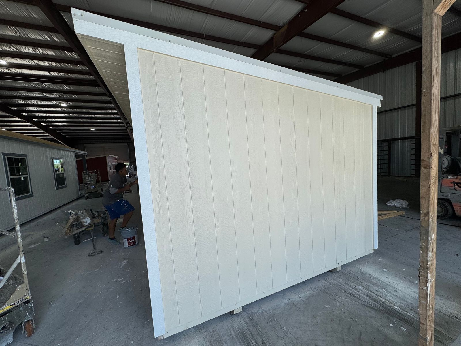 10x16 Stor-Mor Cottage Shed in Navajo White, angled view of the opposite side wall