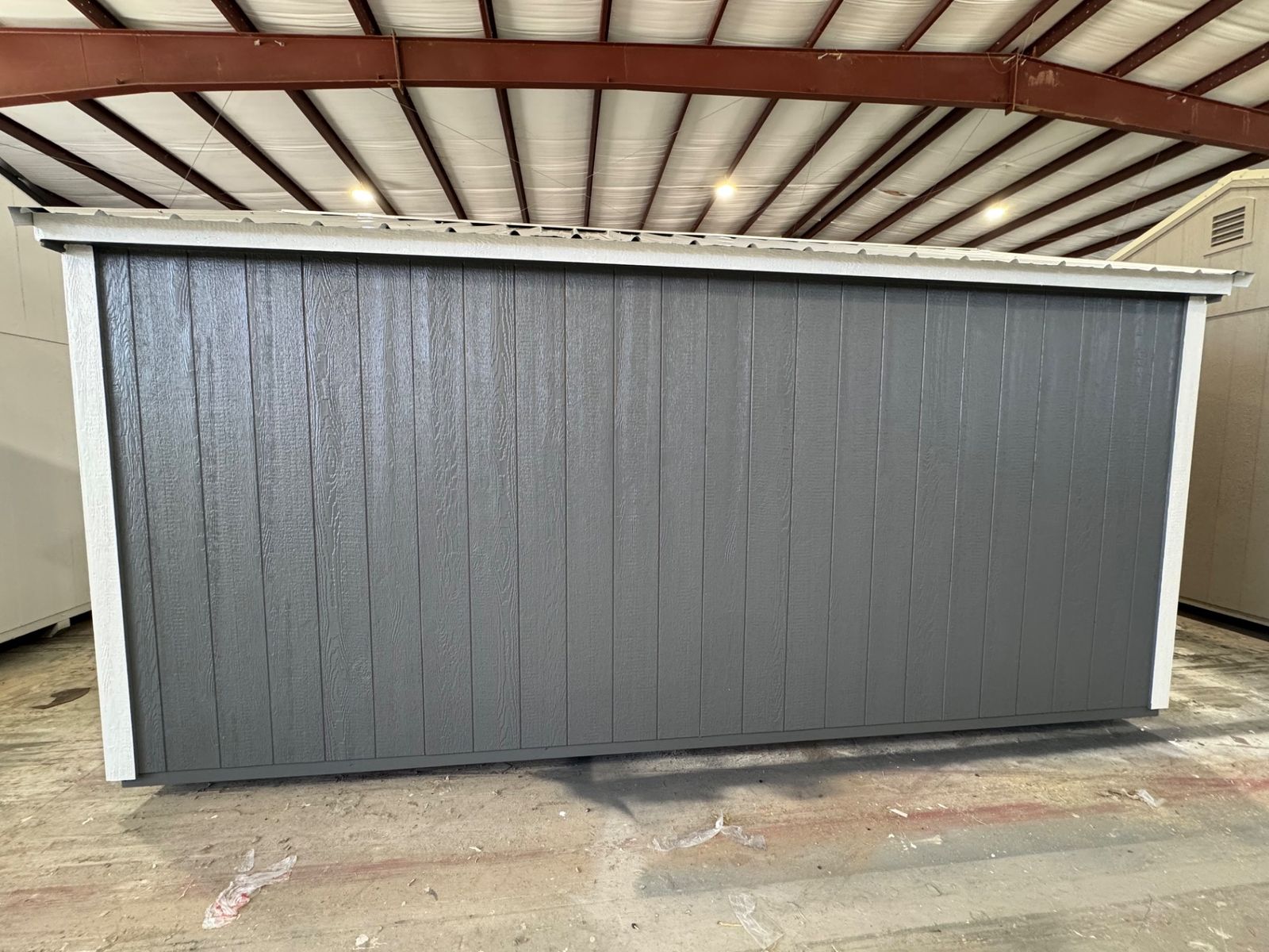 10x16 Stor-Mor Garden Shed in Dark Gray, rear wall with white trim and Galvalume roof