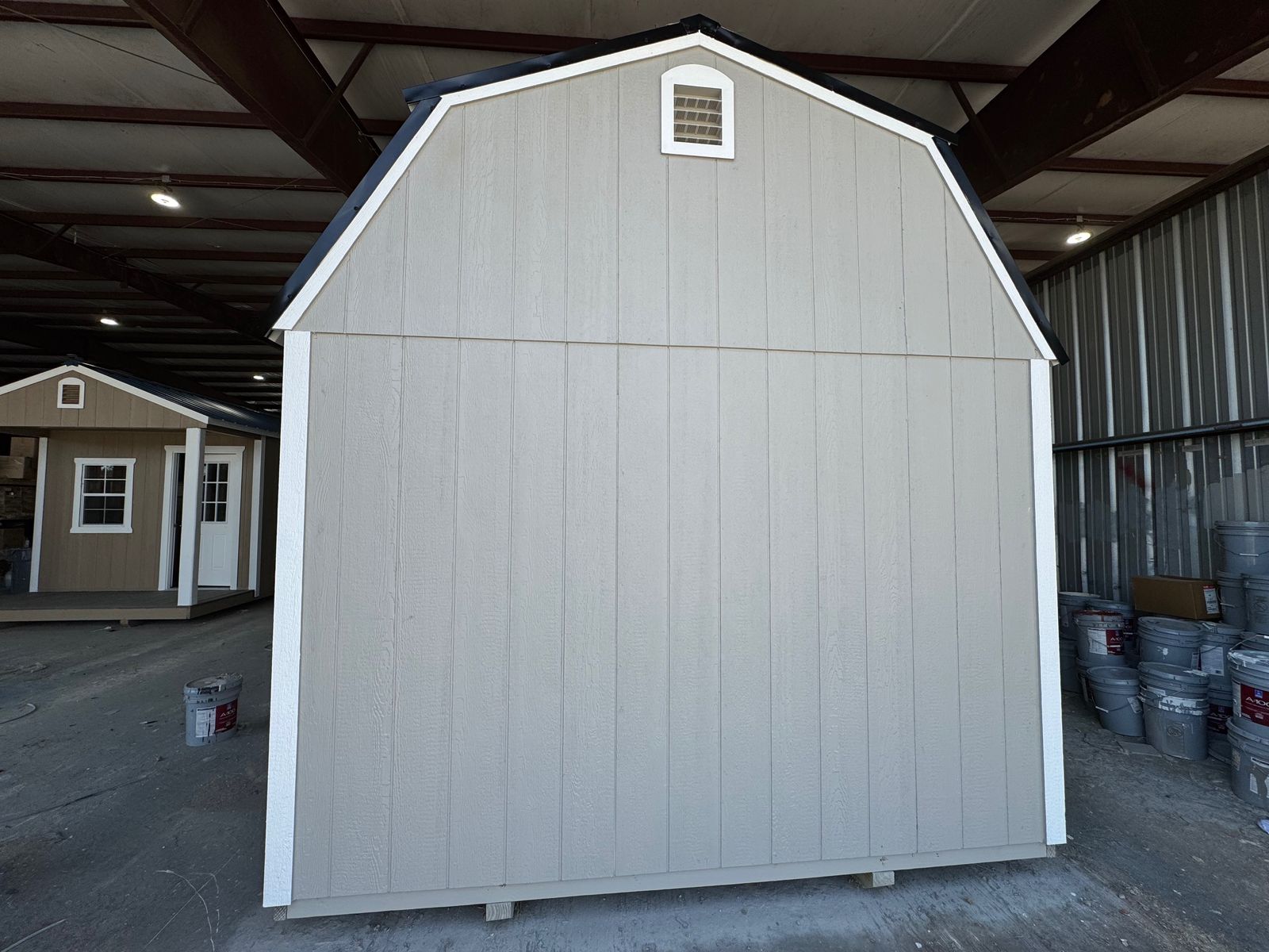 Opposite gable end of the 10x16 Light Gray Side Lofted Barn with a vent near the peak