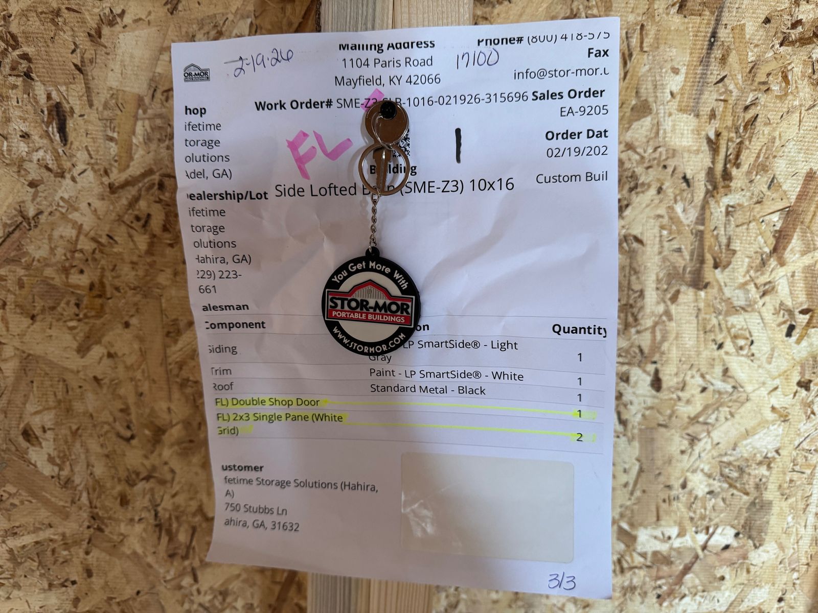 Factory work order sheet for the 10x16 Light Gray Side Lofted Barn with keys attached