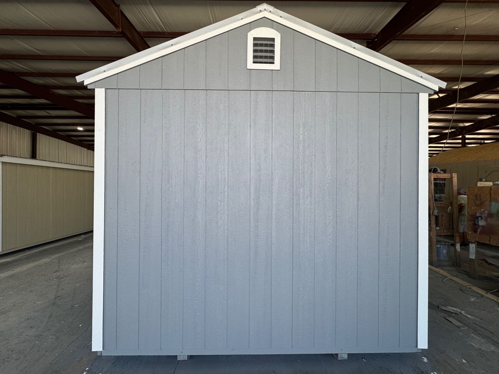 Opposite gable end of the 10x16 Cape Cod Gray Side Utility with a vent near the peak