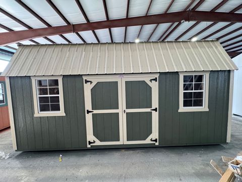 10x20 Stor-Mor Side Lofted Barn in Avocado with New Holland Beige trim, double shop doors on the long wall and a Light Stone roof