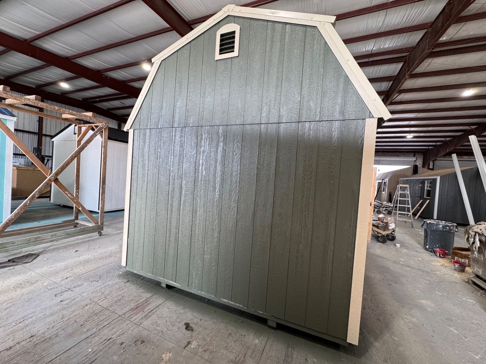 Corner view of the opposite gable end on the 10x20 Avocado Side Lofted Barn with a vent near the peak