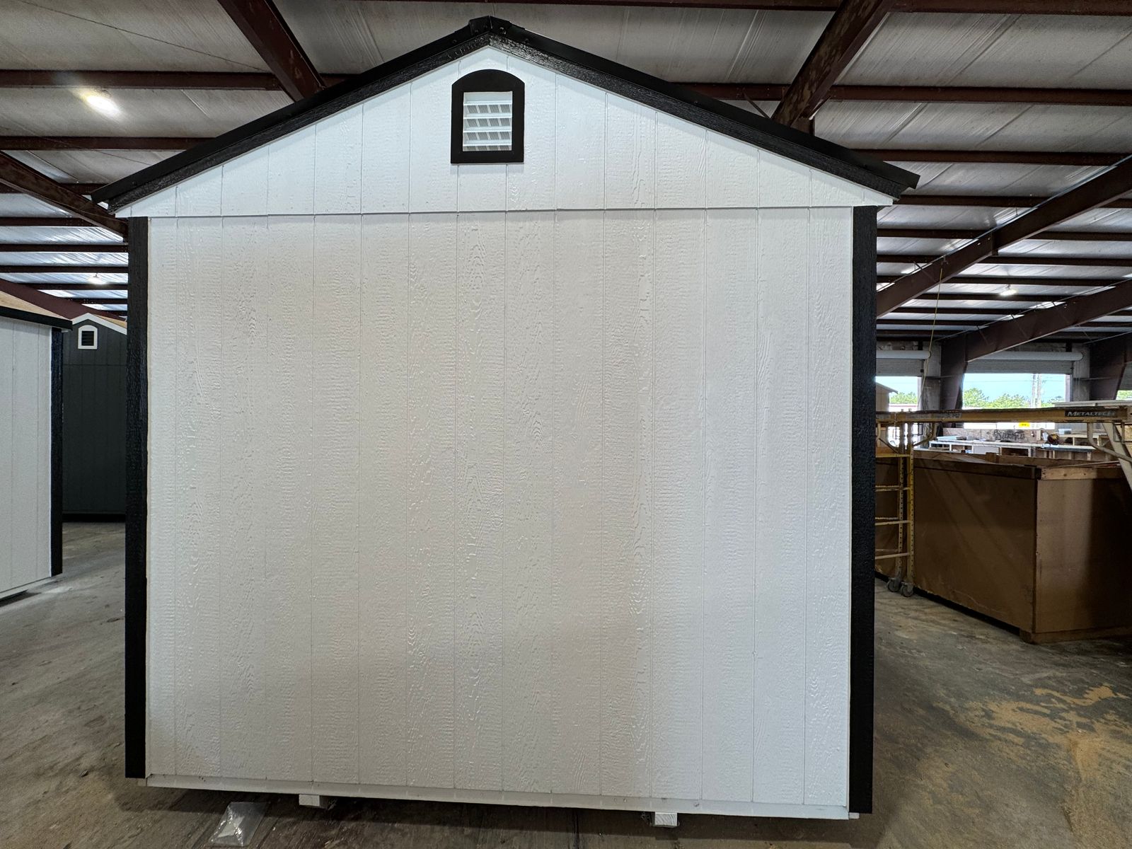 10x20 backyard office in white, gable end with black trim and vent
