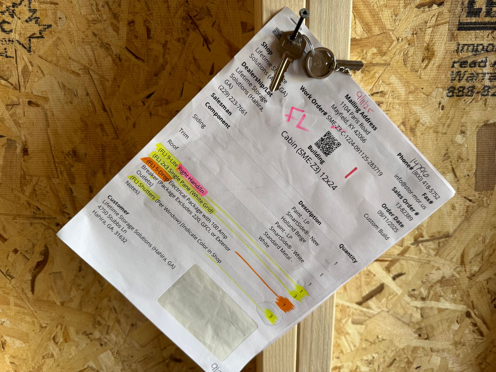 12x24 New Holland Beige Stor-Mor cabin factory work order sheet with keys attached