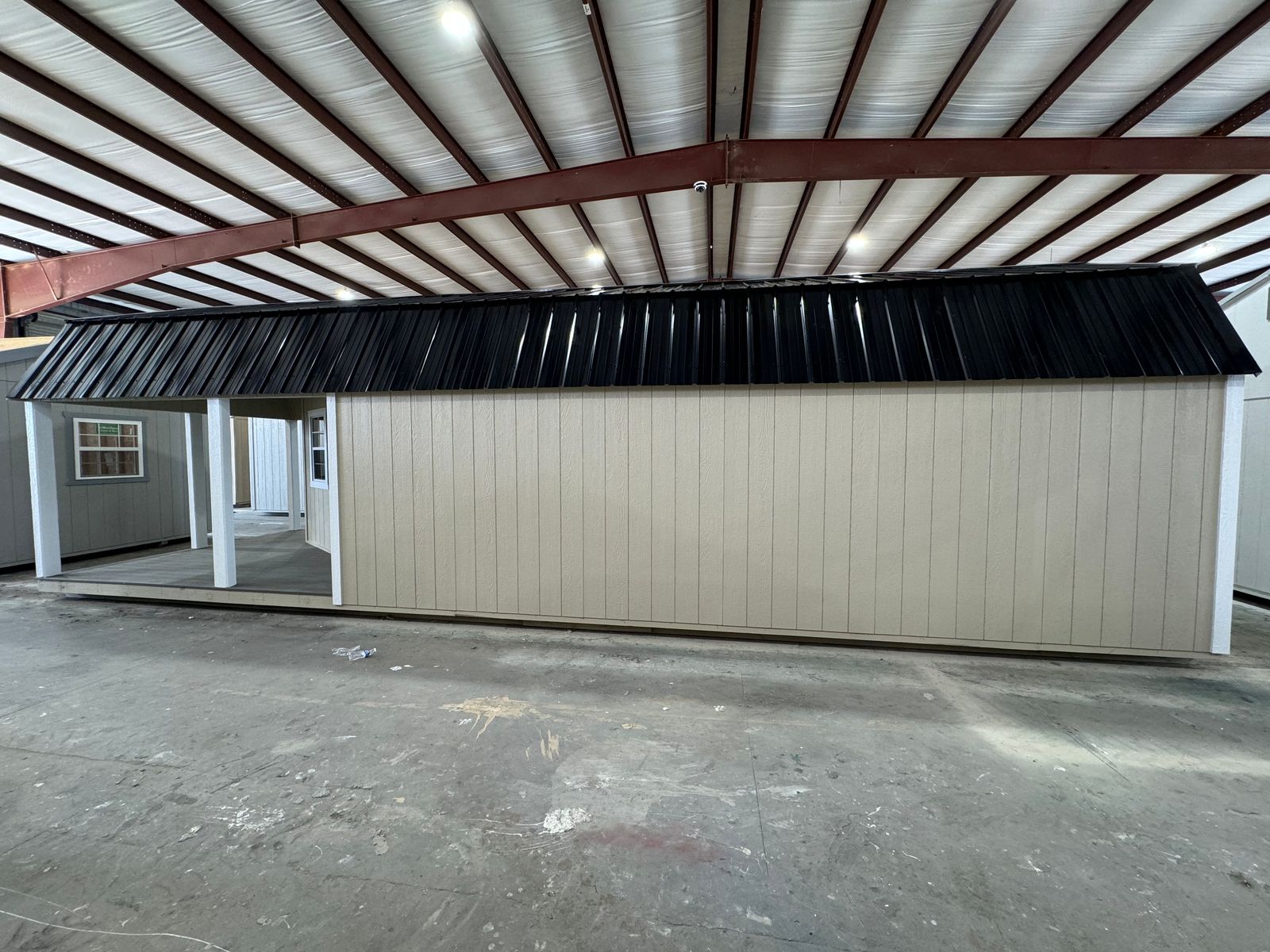 12x36 New Holland Beige Stor-Mor Deluxe Lofted Barn Cabin, opposite long side with porch end