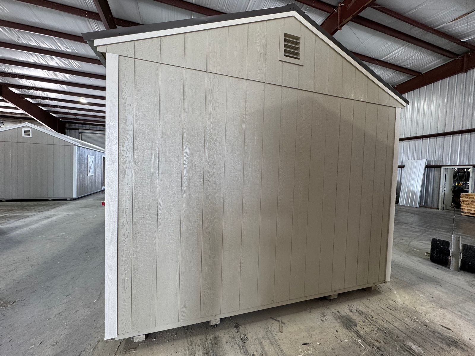 12x40 New Holland Beige Stor-Mor Side Utility, opposite gable end with vent