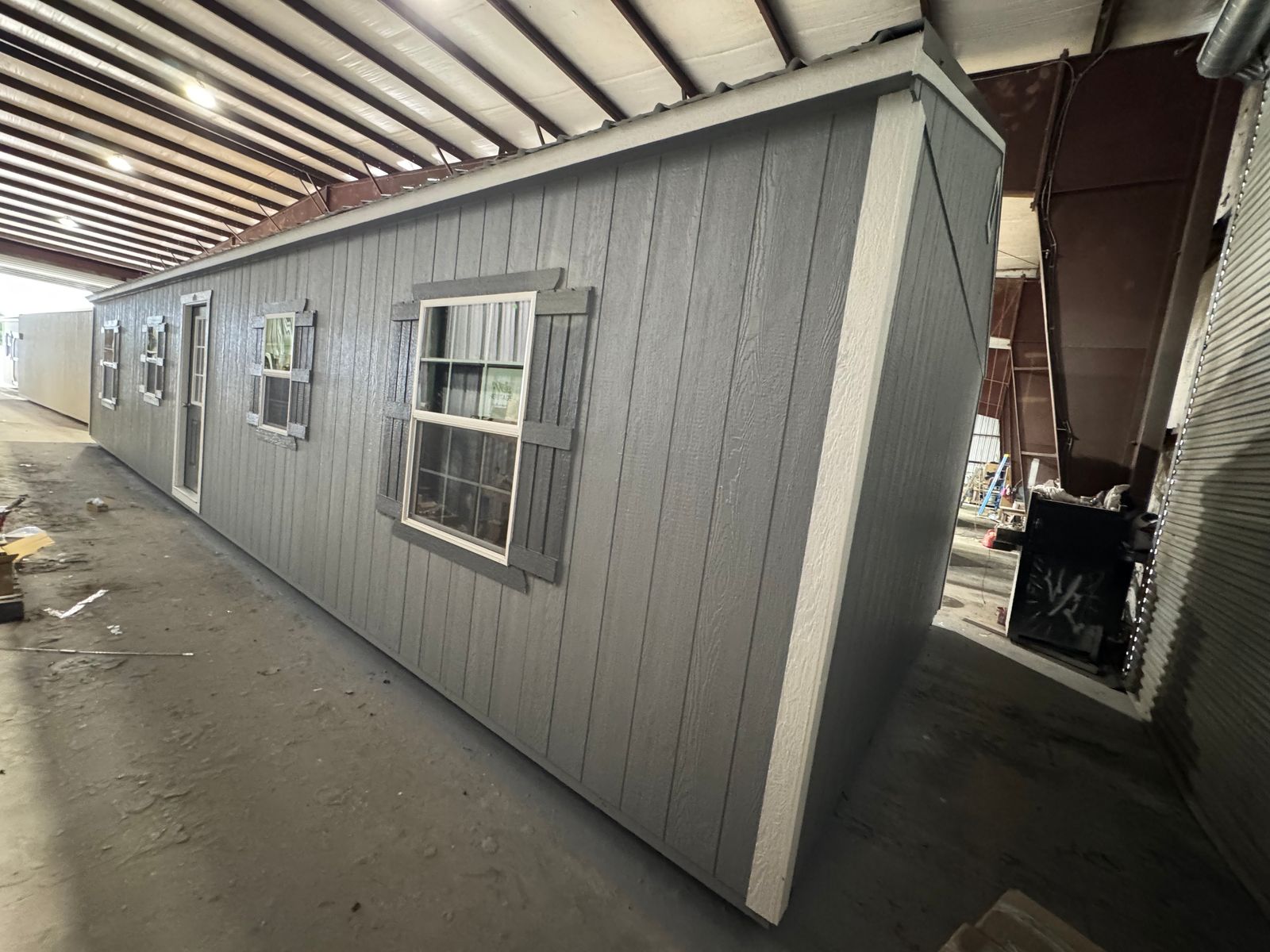 16x44 Cape Cod Gray Stor-Mor Side Utility workshop, corner view of front with shuttered windows