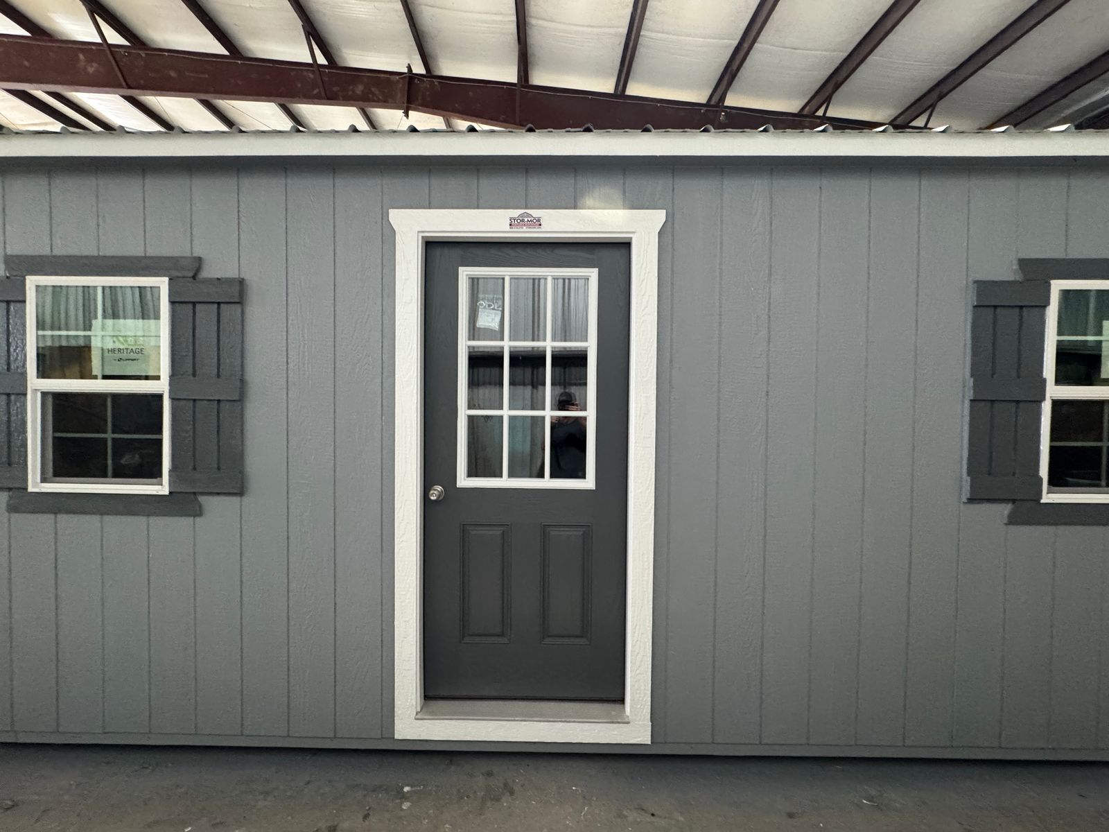 16x44 Cape Cod Gray Stor-Mor Side Utility workshop, 6-lite door between shuttered windows