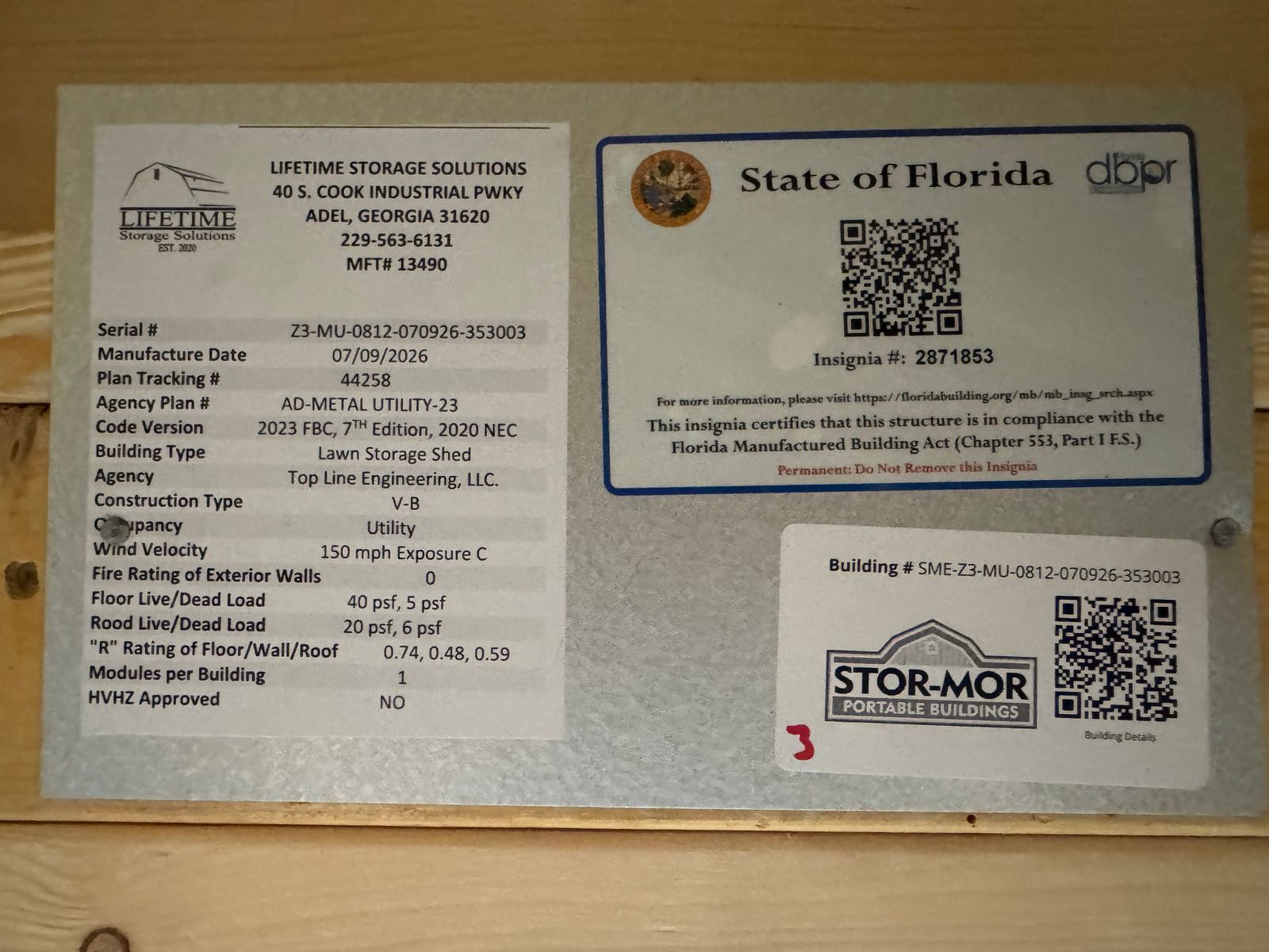 8x12 Stor-Mor Metal Utility State of Florida insignia and manufacturer data plate