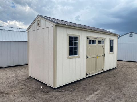 8x20 Stor-Mor Side Utility shed in Navajo White with New Holland Beige trim, a painted accent door, shutters and a Burnished Slate roof