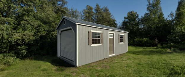 Portable Garage with roll-up door and gable roof