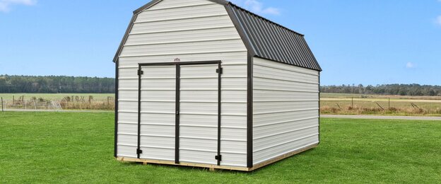 Metal Lofted Barn with gambrel roof and metal siding