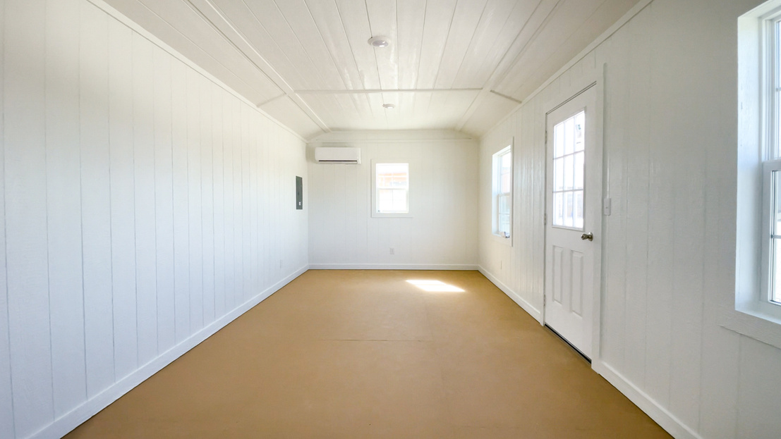 Smart Space finished shed interior with paneled and painted walls